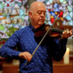 manus-mcguire-performing-irish-fiddle-music